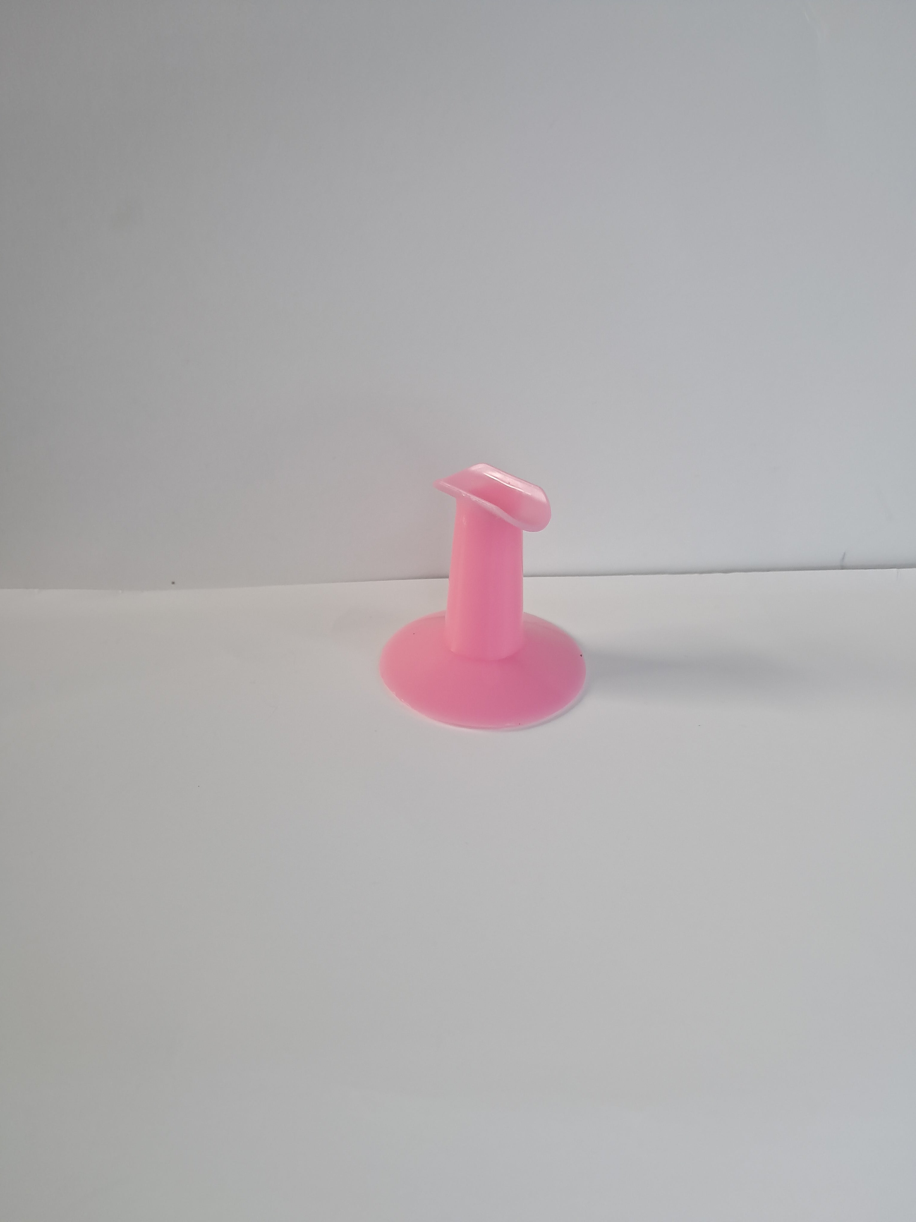 Stationary nail holder