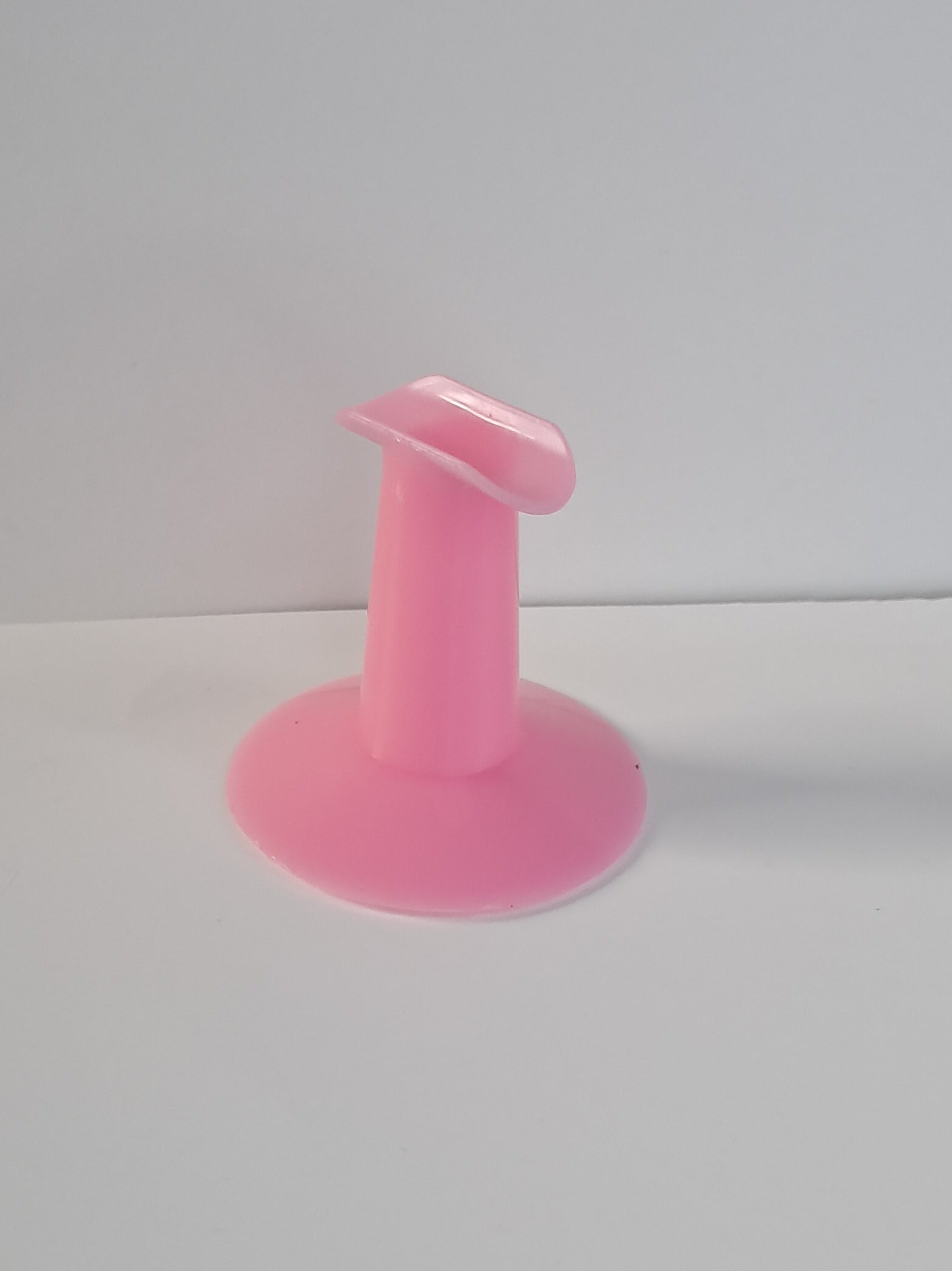Stationary nail holder